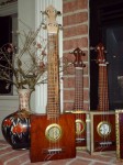 family of 4 ukuleles, 2 concert and 2 baritone